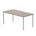 The photograph shows a sleek, modern rectangular table measuring 1600x800. It features a stunning Alaskan grey oak finish and is supported by a silver core. Perfect for a versatile office space.