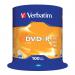 The photograph shows a stack of unprinted Verbatim DVDs in a spindle, each with a capacity of 4.7GB and a recording speed of 16x. There are 100 discs in the pack. The DVDs have a silver finish and are neatly stacked and ready for use.